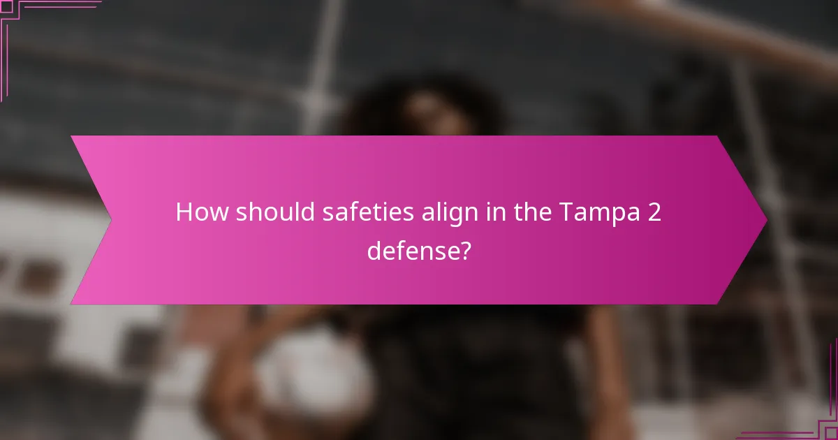 How should safeties align in the Tampa 2 defense?